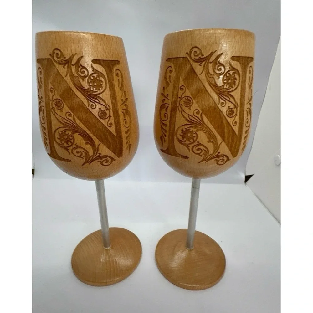 Two wooden monogrammed 'N' wine glasses. NEW.